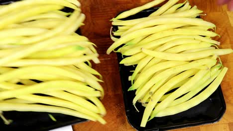 Placing-Butter-Beans-on-to-Cutting-Board