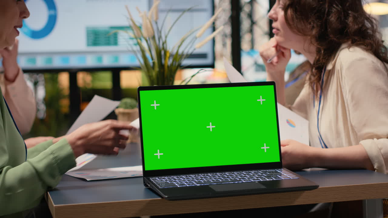 Group of women leaders gathers near isolated copy space in office environment