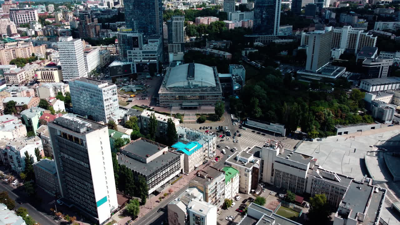 Kyiv central district near Olympic stadium. Flying over buildings in downtown. Aerial 4k