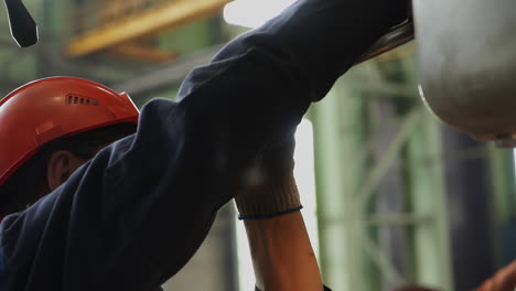 industrial worker performing maintenance