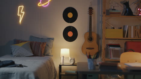 teenage bedroom with music and study area