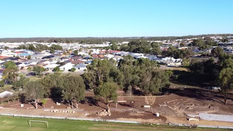 forward aerial view towards riverlinks park all abilities playground construction after flooding