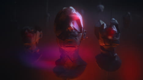 three crushed android heads on spikes in hell