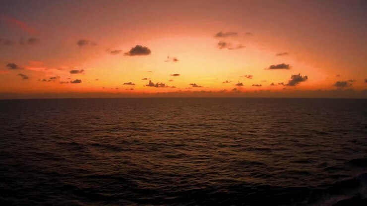 Sundown on the Gulf of Mexico, The smoke from the fires in California have given an ominous orange red glow to the setting sun