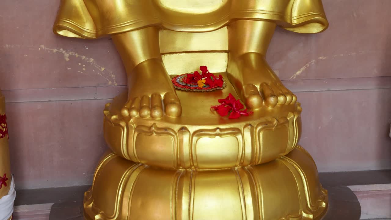 holy offering by devotee to the holy feet of ultimate divine at temple