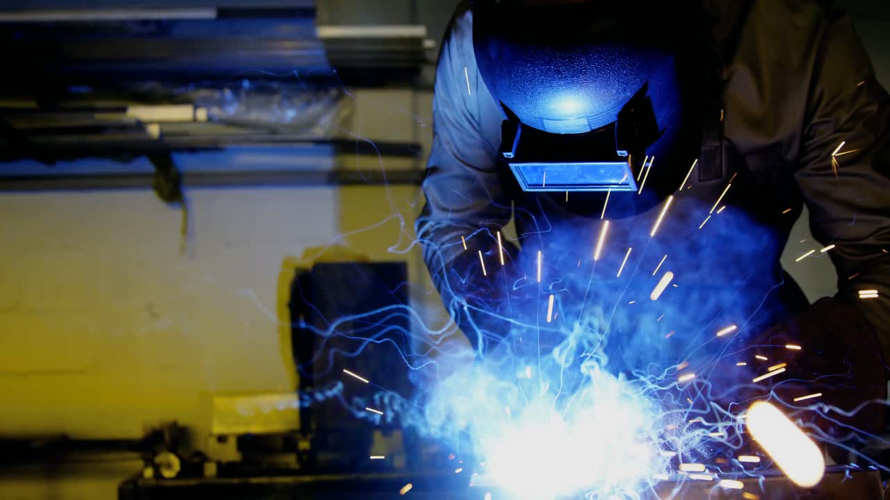 Welder welding a metal
