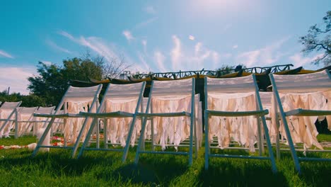 A-row-of-chairs-on-green-grass