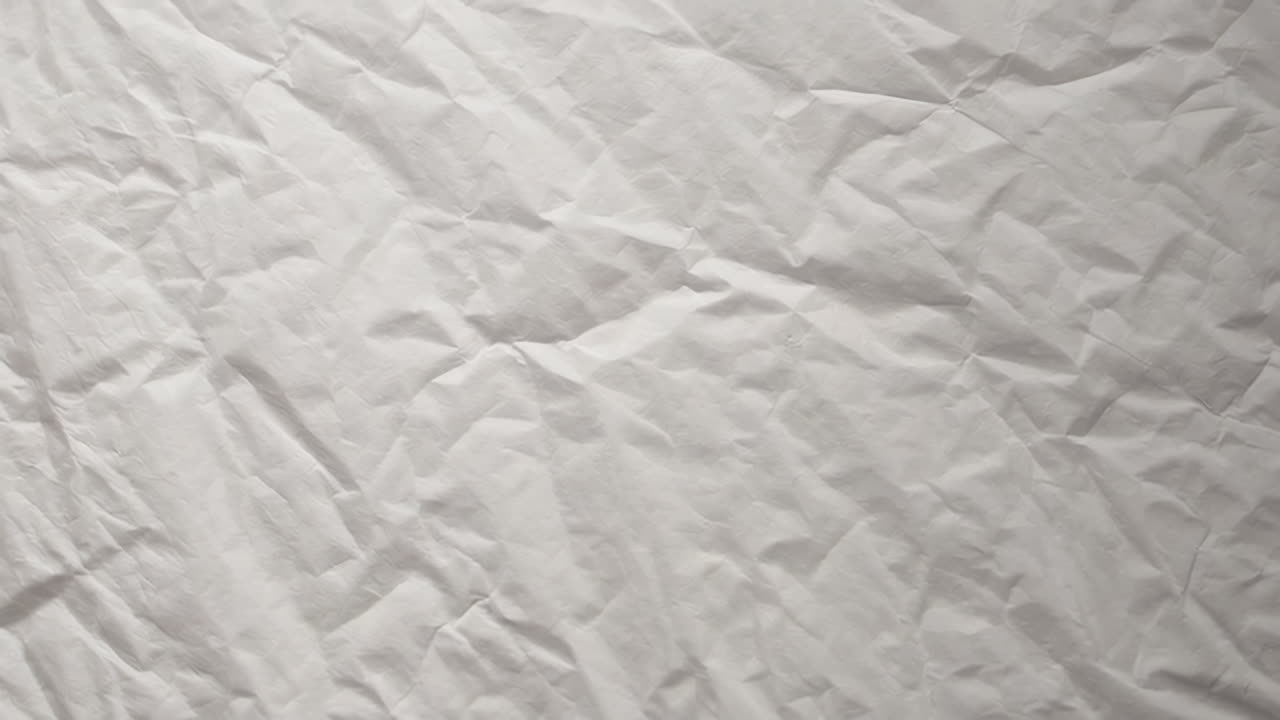 折りたたまれた白い紙のテクスチャの背景