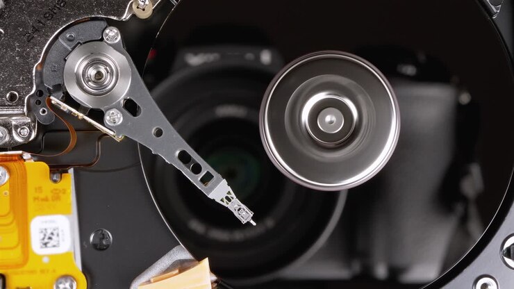Hard Disk Drive Inside. Structure of HDD, Spinning Platter. Move magnetic head