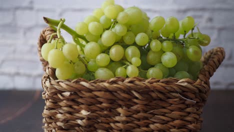 Green grapes in a wicker basket