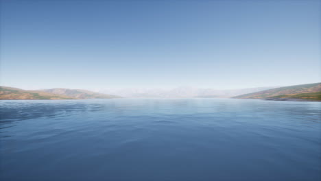 lake in hills on summer day