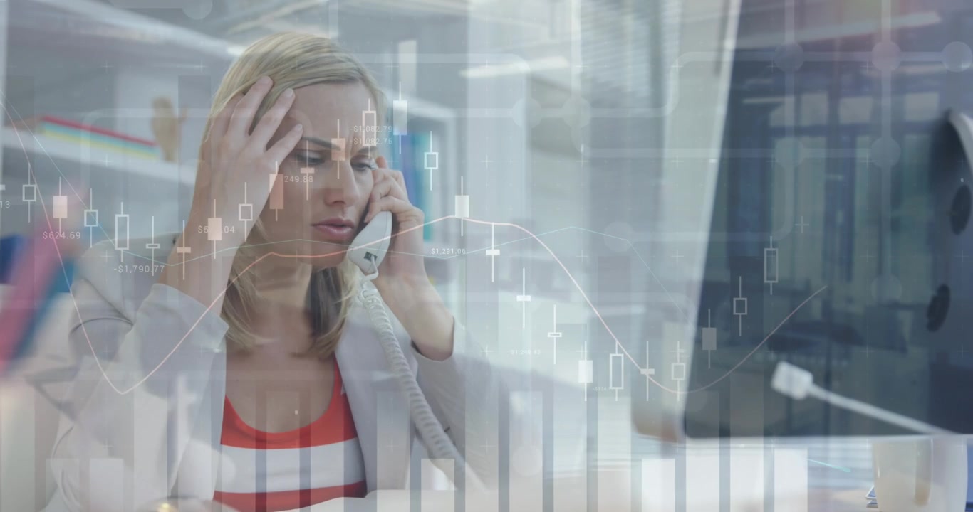 Stressed Businesswoman Talking on Phone in Office with Financial Data Overlay