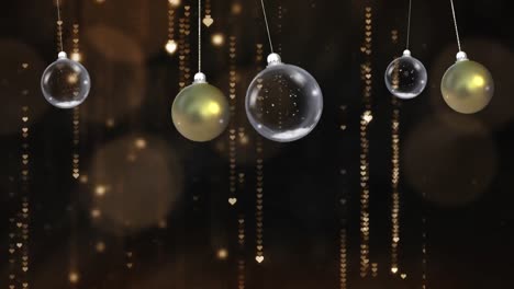 animación de bolas de navidad colgando sobre senderos de luz dorada con luz brillante en el fondo