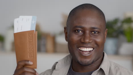 happy traveler with passport and tickets