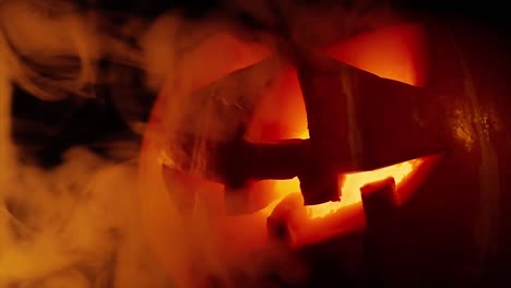 scary old jack-o-lantern on black background.