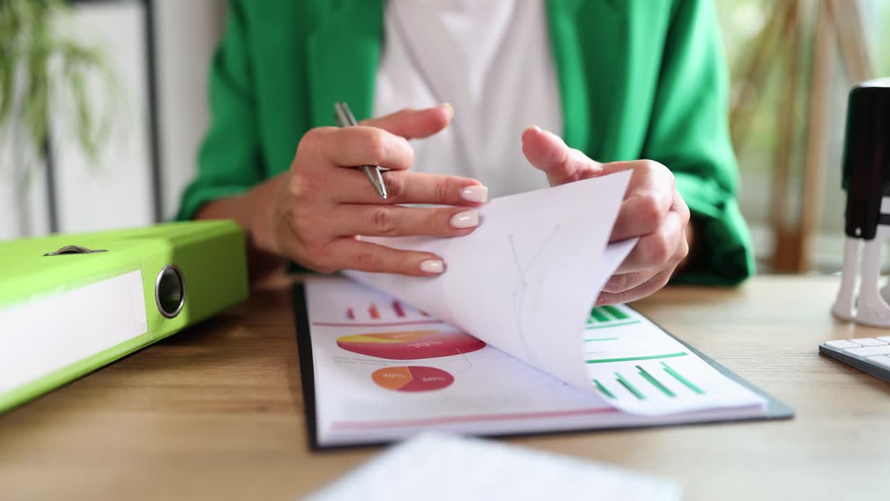Businesswoman Analyzing Financial Data in the Office