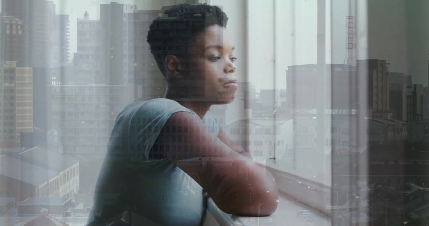 Animation of african american woman looking through window over cityscape