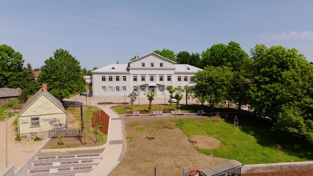 Aerial view shows Aizpute Health and Social Care Center with modern courtyard