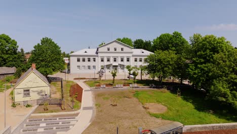 aerial view shows aizpute health and social care center with modern courtyard