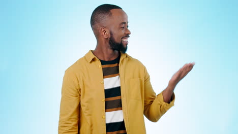 pointing, you and black man with thumbs up on blue