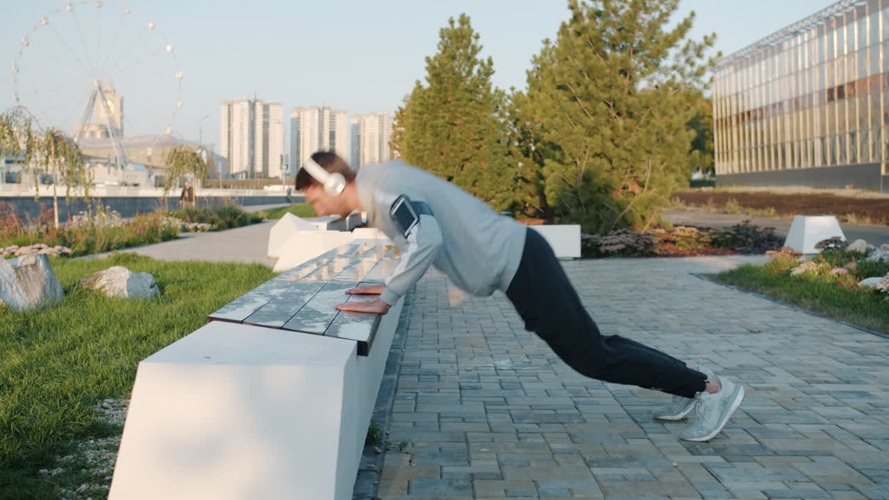 Man exercising in a city park
