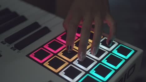 person playing midi controller