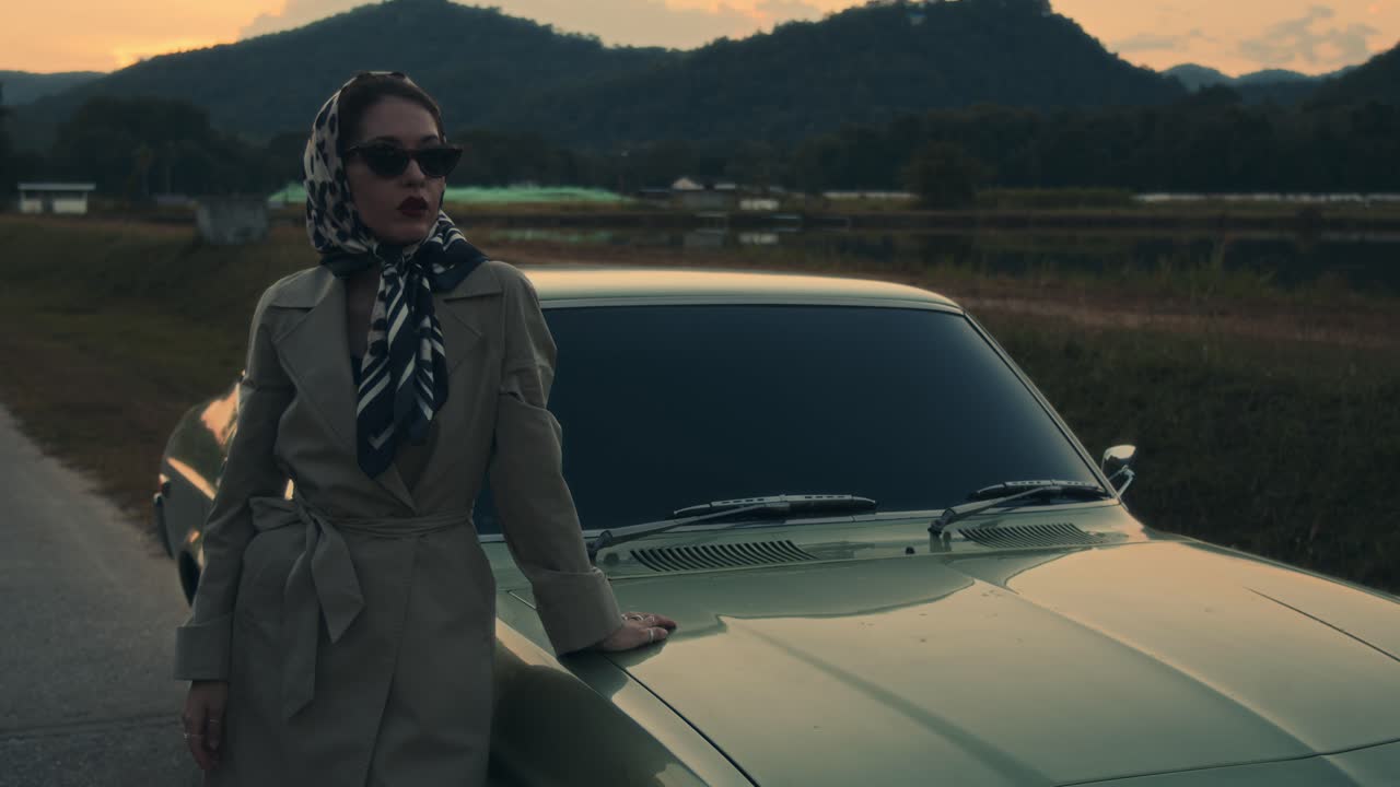 Vintage Fashion by a Classic Car at Sunset
