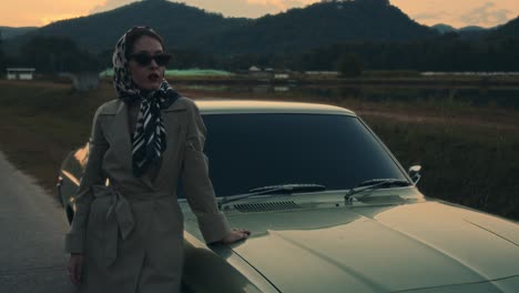 Vintage Fashion by a Classic Car at Sunset
