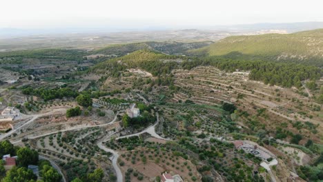 aerial view move away shot, scenic view of murcia towns of aledo, alhama, totana, mula and pliego in sierra espuna in spain