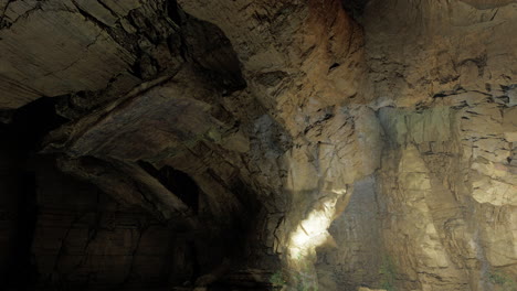 captivating cave interior showcasing natural rock formations and light