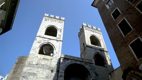 ancient stone towers in an italian city