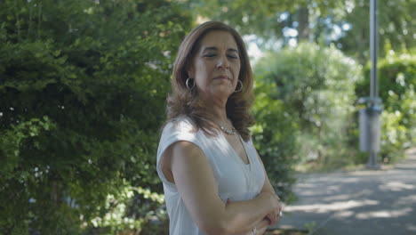 elegant woman changing body position, looking at camera, posing