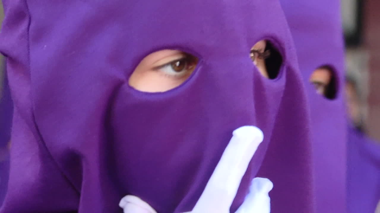 Religious Procession with Purple Masks