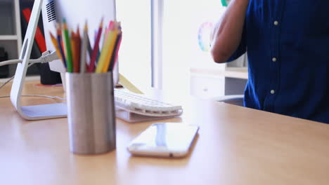 male executive using personal computer at his desk 4k