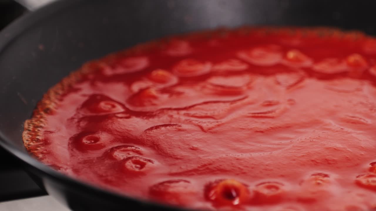 Tomato Sauce Cooking in a Pan