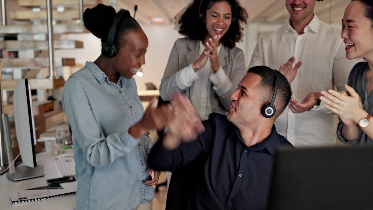 Call center, clapping and people winning