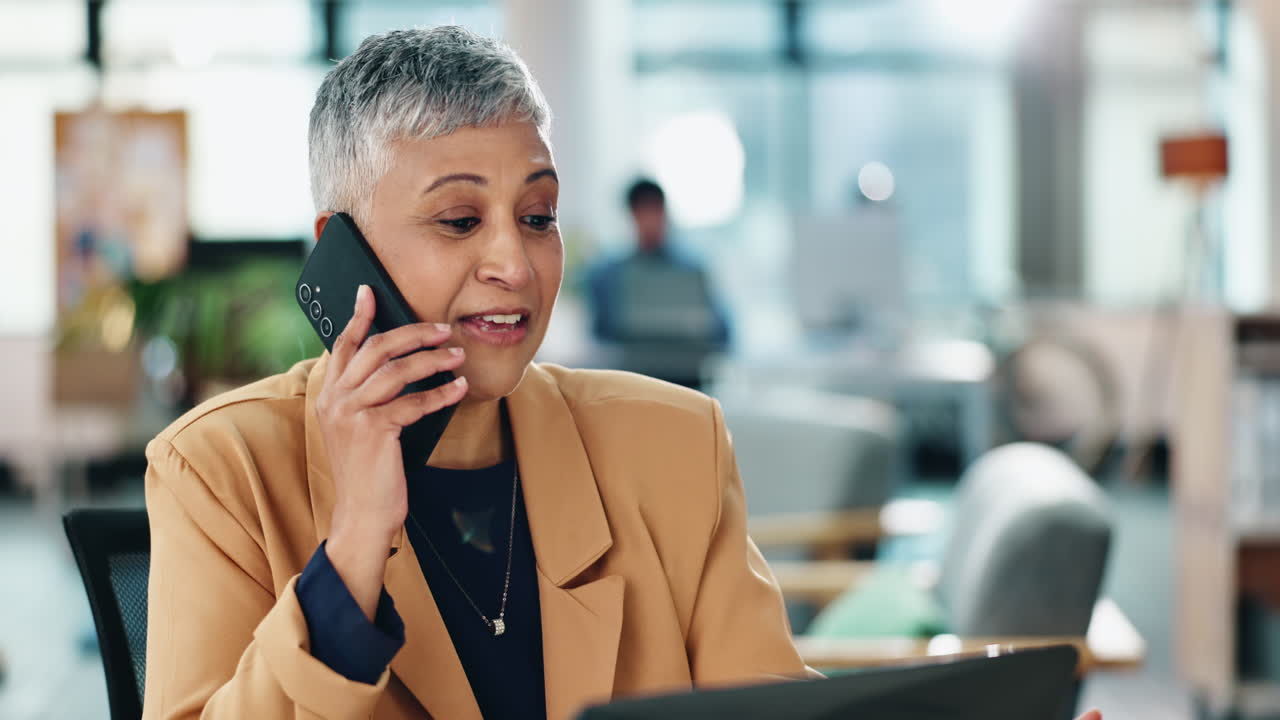 Businesswoman talking on the phone in an office