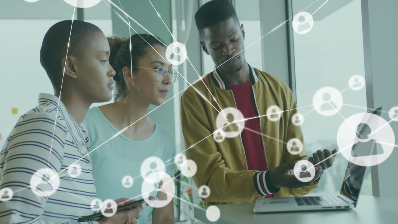 Animation of connections with icons over diverse business people in office