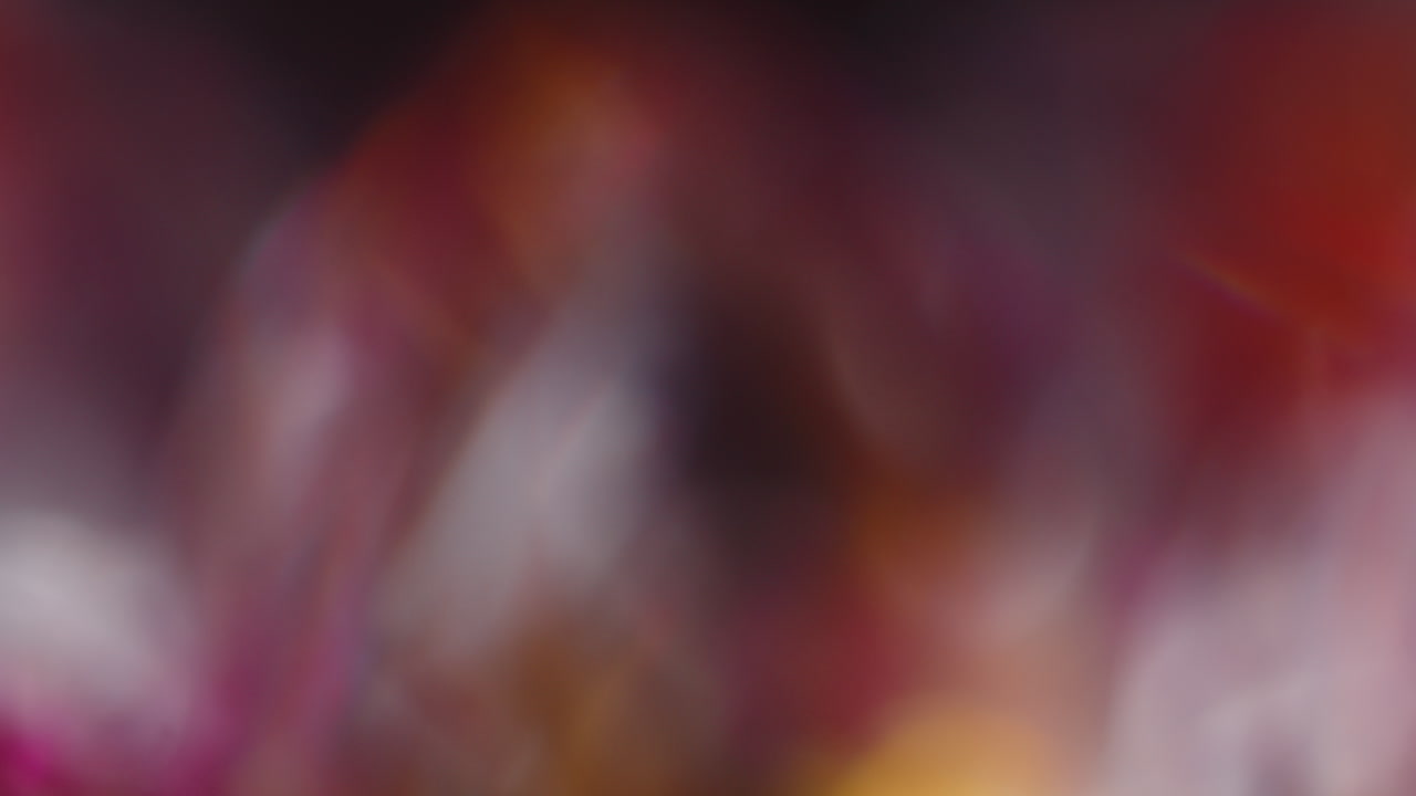 Multicolored light leaks 4k footage on black background stylizing video transitions bokeh effect