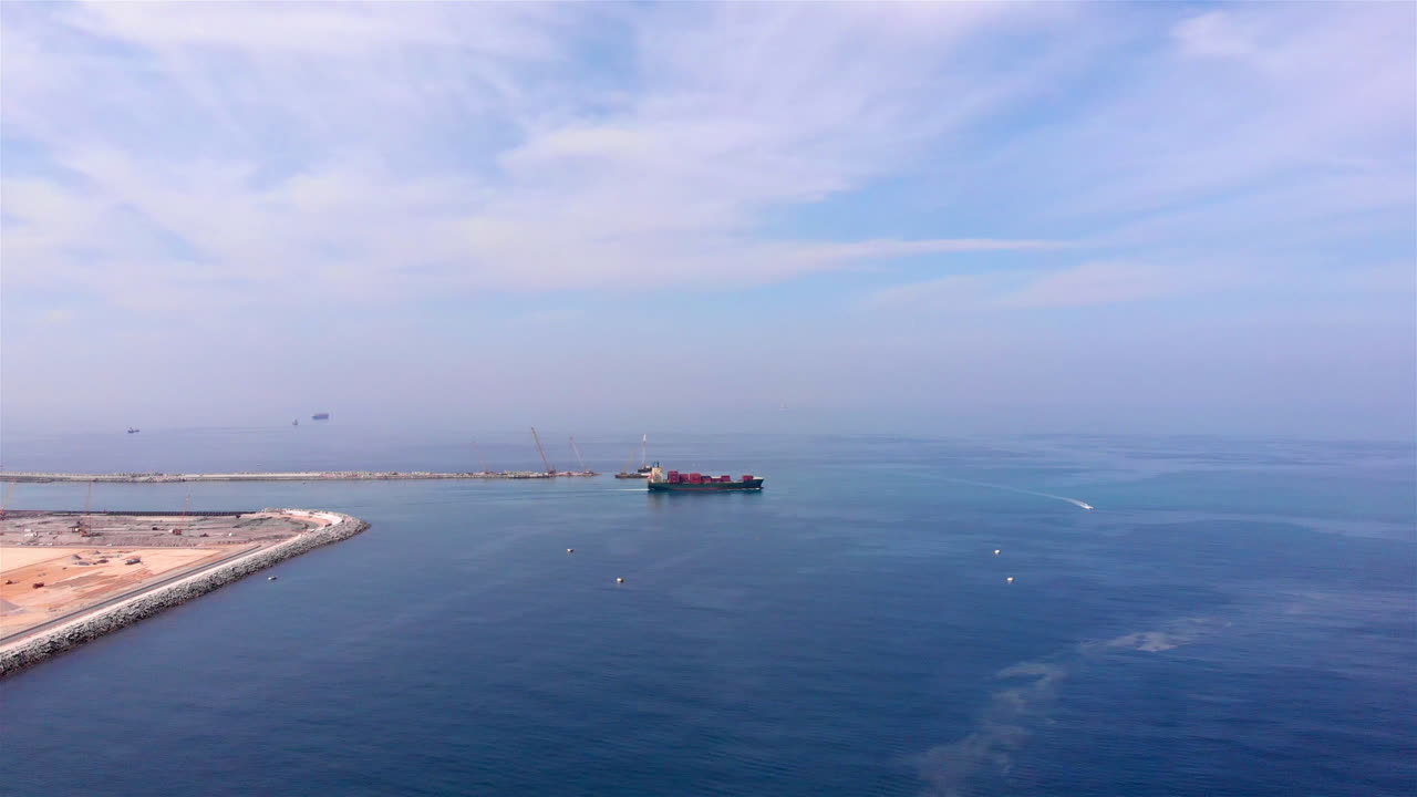 Aerial footage of Cargo Ship Leaving harbour, Israel