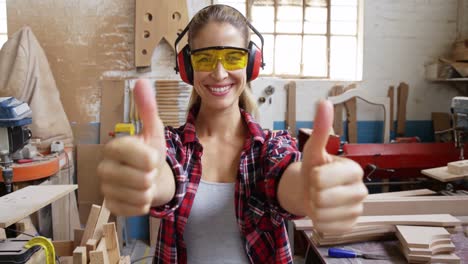 Portrait-of-attractive-carpenter-smiling-for-camera