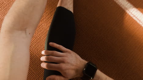 person exercising: legs, compression, and running on track
