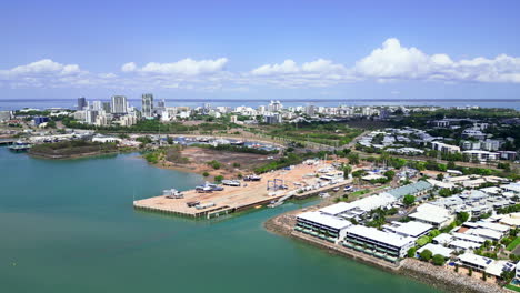 Aerial-drone-footage-marina-docks-boats-and-yachts-in-blue-ocean-sea-water