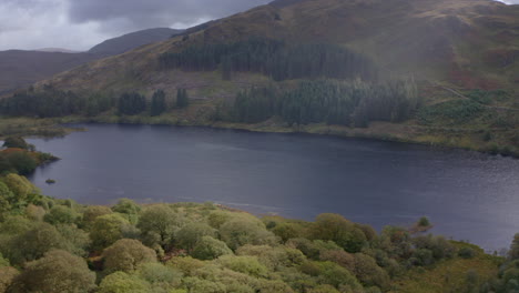 Drone-Aerial-view-of-Loch-Trool,-Glen-Trool,-Galloway-Hills,-Scotland