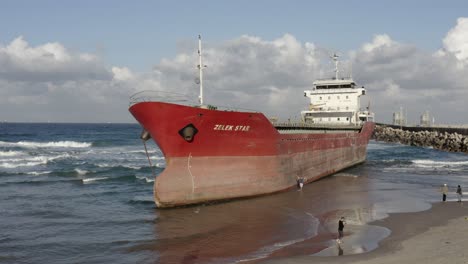 stranded cargo ship on beach