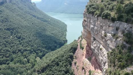 Aerial-views-of-Tavertet-cliffs-in-Catalonia-and-Sau-lake