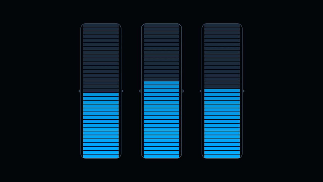 Tres medidores de nivel de audio digitales verticales fluctuando