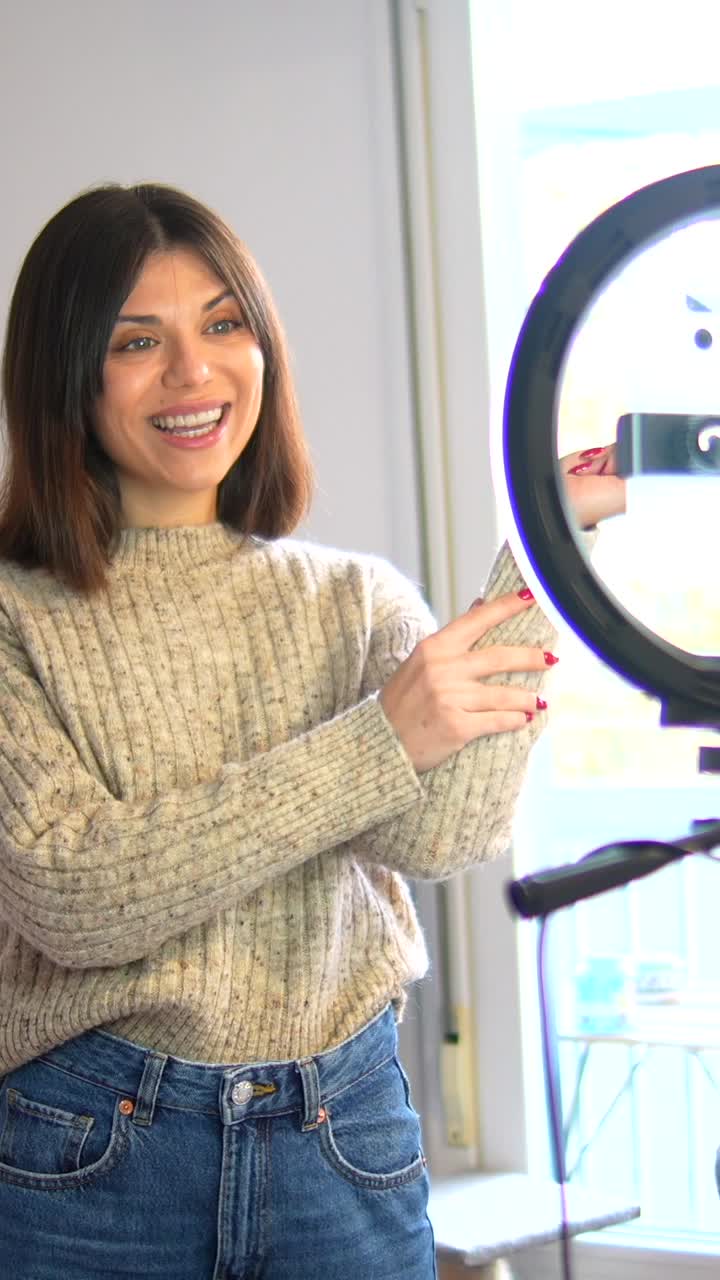 Woman in Sweater Explaining Something