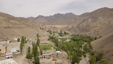 Picturesque-Landscape-Of-Moonland-With-Lamayuru-Monastery-And-Poplar-Trees-On-Summer---Tibetan-Buddhist-Monastery-In-Lamayouro,-Leh-District,-India