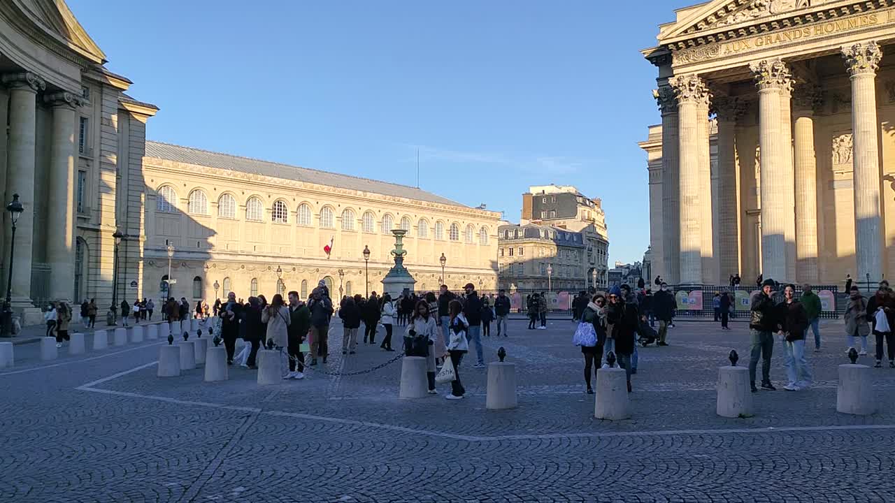 People gather in front of the historic Pantheon in Paris, France